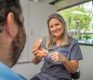 A dental staff with patient