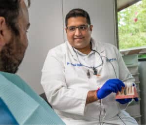 dentist in duncanville with a patient