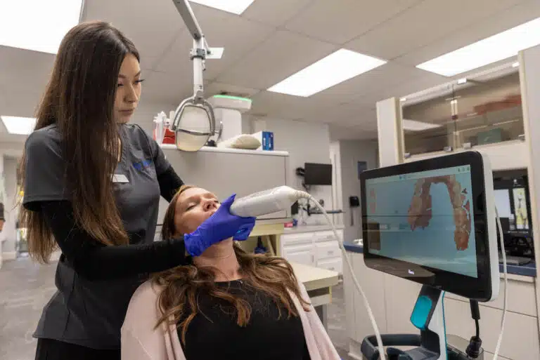 Dental Assistant 3D scanning patients teeth at Singla Dental in Duncanville,TX