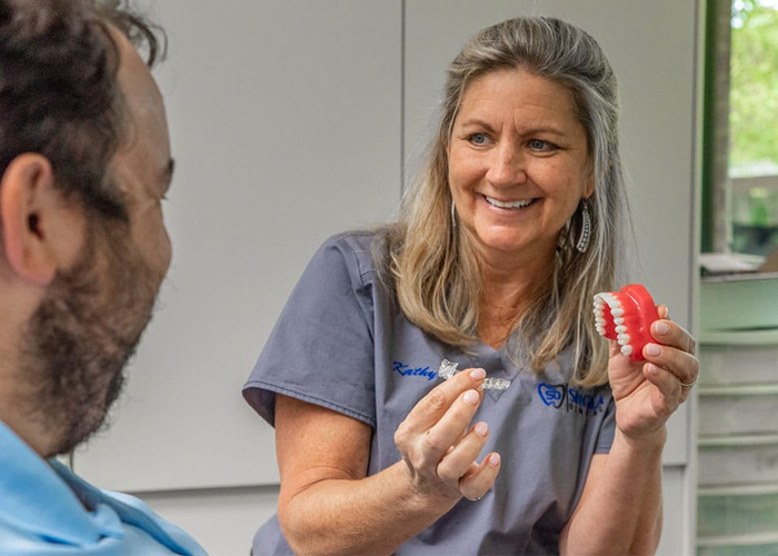showing a patient invisalign in duncanville, tx